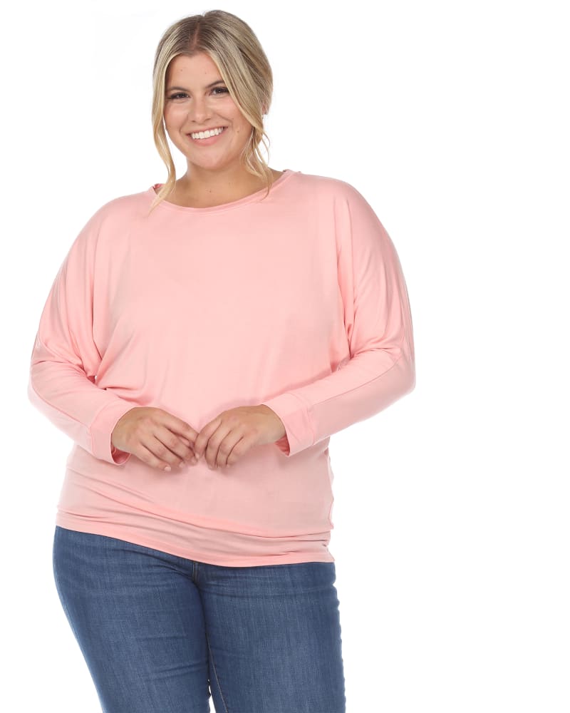Front of a model wearing a size 1X Dolman Sleeve Top in Coral by White Mark. | dia_product_style_image_id:257343
